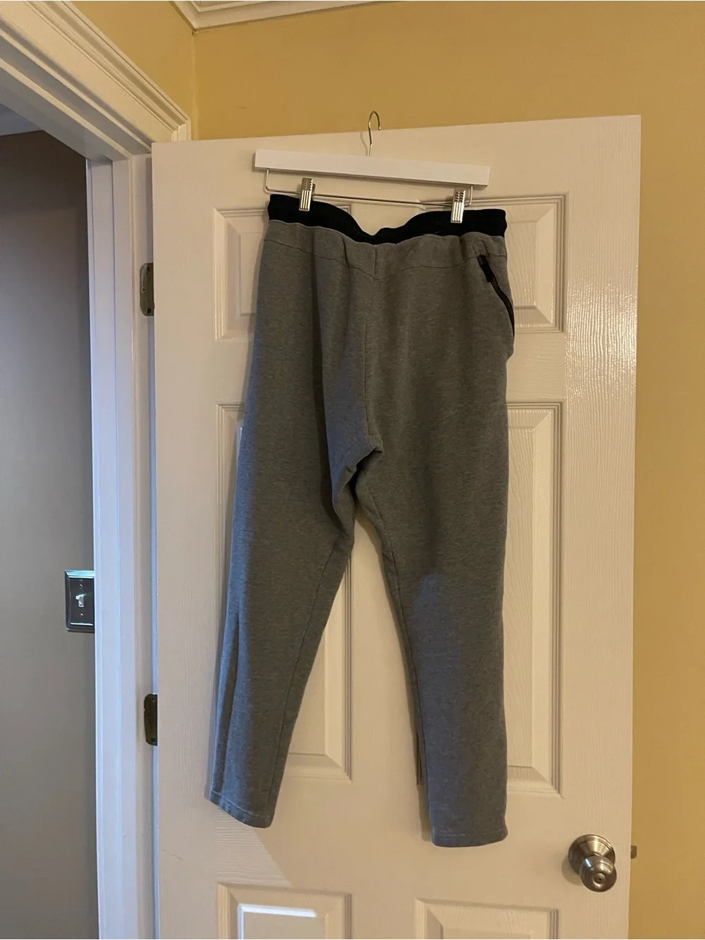 Nike Gray Sweatpants with Black Drawstring and Red Logo Tag